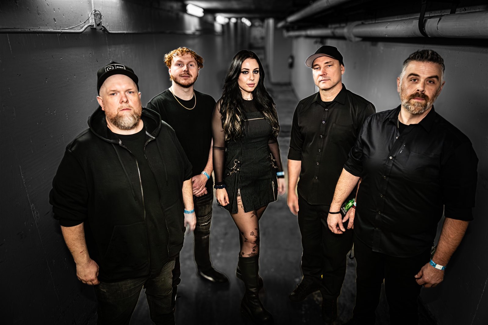 Perrish 9 together for a backstage group photograph